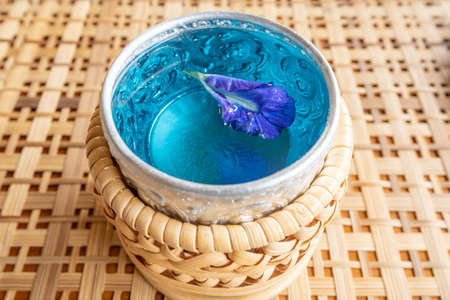 Fresh purple Butterfly pea juice in little bowlの写真素材
