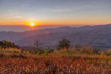 beautiful landscape with mountain on sunrise ,northern in Thailandの写真素材