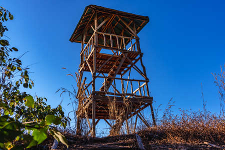 Old wooden tower on the mountain forest in Thailandの写真素材