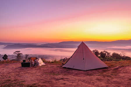 Loei,Thailand - January, 07,2022 : Tent camping on the mountain sunrise landscape at Loei province, Thailand.のeditorial素材