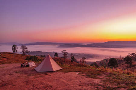 Loei,Thailand - January, 07,2022 : Tent camping on the mountain sunrise landscape at Loei province, Thailand.のeditorial素材