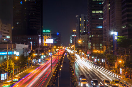 BANGKOK- long exposure of night traffic at sathorn-narathiwas road in bangkok thailand on 6 April...