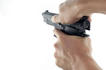 hand holding a handgun