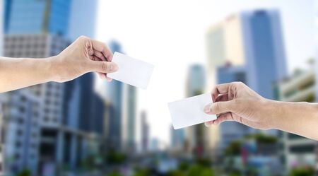 hand exchanging a cardの写真素材