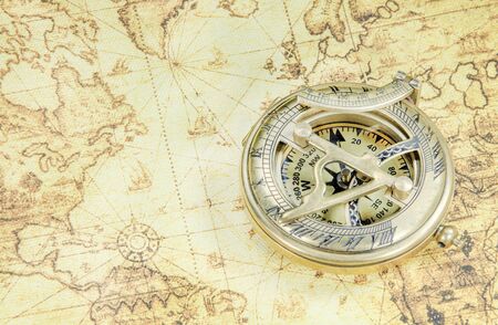 compass on a old world mapの写真素材