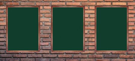 Chalkboard on a brick wallの写真素材