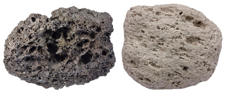 Highly vesicular volcanic rocks scoria (black) and pumice. Scoria is from Tenerife, pumice is from Santorini.の写真素材