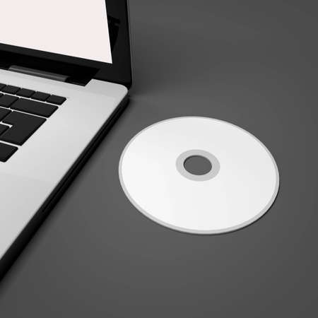 Laptop and CDの写真素材