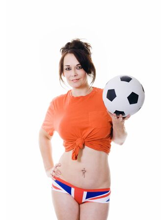 woman with soccer ball and union jack underwearの写真素材