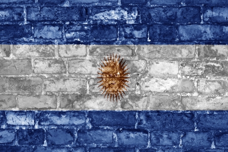 Grunge style wall with Argentinian flag graphicの写真素材