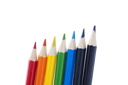 pencils showing the colours of the rainbow isolated on whiteの写真素材