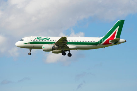 ST. PETERSBURG, RUSSIA - JULY 24, 2015: Flying the Airbus A320 EI-DTN of Alitaliaのeditorial素材