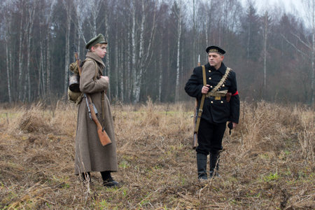 GATCHINA, RUSSIA - FEBRUARY 07, 2015: Soldier and sailor. The participants of the international military-historical festival "the Civil war in Russia. Northwest, 1919"のeditorial素材