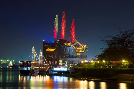 HO CHI MINH CITY, VIETNAM - DECEMBER 20, 2015: Scarlet sails over Saigon. Sightseeing sailing ship...