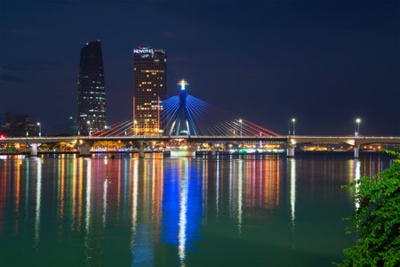 DA NANG, VIETNAM - JANUARY 06, 2016: The south bridge and high-rise buildings in the city center of Danang, night lightingのeditorial素材