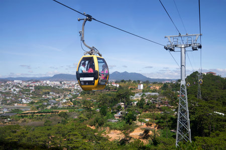 DALAT, VIETNAM - DECEMBER 28, 2015: Cabin cable car with tourists rides by cable car in the city of Dalatのeditorial素材