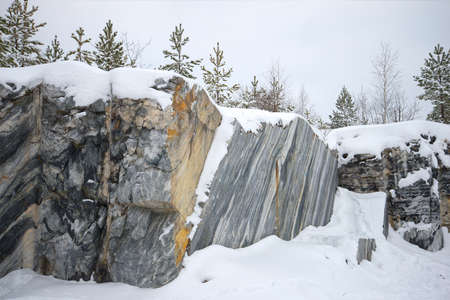 Slice of Italian marble in the quarry on a cloudy january day. Ruskeala, Kareliaの写真素材