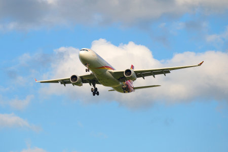ST. PETERSBURG, RUSSIA - JULY 24, 2015: The Airbus A330-343 B-5910 Hainan Airlines on glide pathのeditorial素材