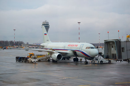 ST. PETERSBURG, RUSSIA - DECEMBER 12, 2015: Preparation for departure of aircraft Airbus A319-114 (VP-BIU) of airline "Russia" in Pulkovo airportのeditorial素材