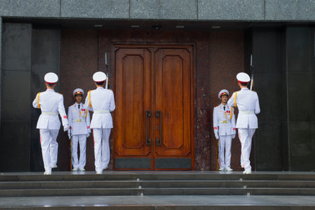 HANOI, VIETNAM - JANUARY 10, 2016: Changing of the guard at the entrance to the mausoleum of Ho Chi Minhのeditorial素材