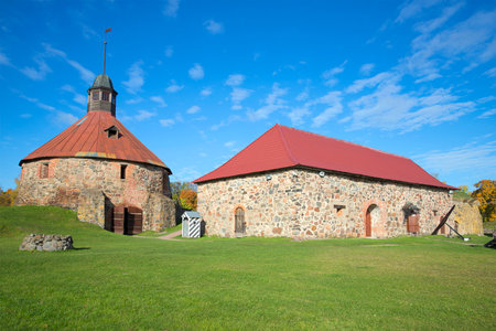The round tower Lars Torstensson and the Old Arsenal building in the fortress Korela. Priozersk, Russiaのeditorial素材