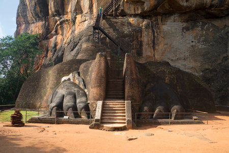 SIGIRIYA, SRI LANKA - MARCH 16, 15: Lion's paws at the beginning of the climb to the top of the cliffのeditorial素材