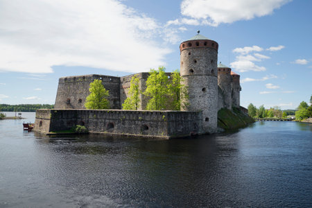 View of the fortress of Olavinlinna sunny june day. Savonlinna, Finlandのeditorial素材