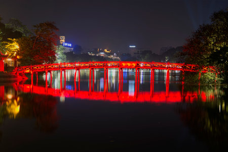 HANOI, VIETNAM - JANUARY 10, 2016: View of the ancient bridge "Rising sun" at night. Hoan Kiem lake in Hanoiのeditorial素材