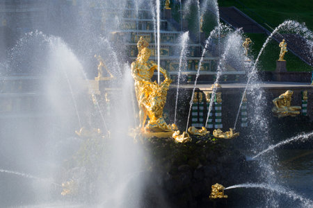 SAINT PETERSBURG, RUSSIA - OCTOBER 05, 2015: The sculpture of Samson in the jets of the Grand cascadeのeditorial素材