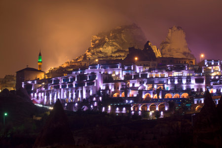 The fortress town of Uchisar, foggy night. Turkeyのeditorial素材
