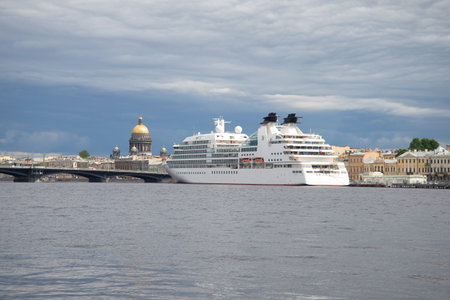 SAINT PETERSBURG, RUSSIA - JULY 21, 2013: A cruise liner is berthed at the promenade des Anglais, cloudy july afternoonのeditorial素材