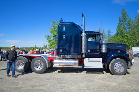 KERIMAKI, FINLAND - JUNE 06, 2015: American classic highway truck tractor Kenworth, side view. The...