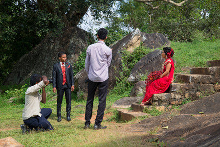 ANURADHAPURA SRI LANKA - MARCH 13, 2015: Wedding photoshoot takes place on the ruins of Vessagiri. The old part of the city of Anuradhapura, Sri Lankaのeditorial素材
