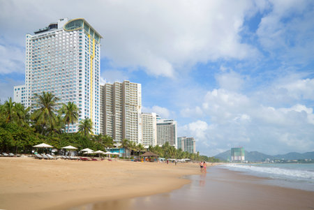 NHA TRANG, VIETNAM - DECEMBER 30, 2015: The city beach in the centre of Nha Trang. Big, the famous beach for tourists in Vietnamのeditorial素材
