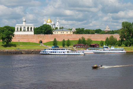 VELIKIY NOVGOROD, RUSSIA - JULY 02, 2016: Tourist ships are at the pier, the cloudy july day on the river Volkhovのeditorial素材