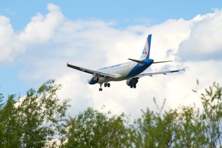 ST. PETERSBURG, RUSSIA - MAY 17, 2016: Airbus A320-214 (VQ-BDM) airlines Ural Airlines landing in Pulkovo airportのeditorial素材