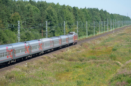 LENINGRAD REGION, RUSSIA - JULY 17, 2015: Stretching into the distance on a passenger trainのeditorial素材