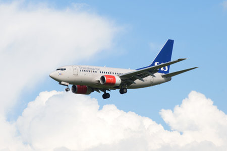 SAINT PETERSBURG, RUSSIA - AUGUST 24, 2016: Boeing 737-683 (LN-RCW) airline Scandinavian Air System in a cloudy skyのeditorial素材
