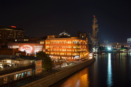 MOSCOW, RUSSIA - SEPTEMBER 06, 2016: View of the factory building "Red October" and the monument to Peter the great September night. Moscow, Russiaのeditorial素材