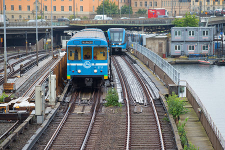 STOCKHOLM, SWEDEN - AUGUST 29, 2016: Two subway trains on the metro bridge