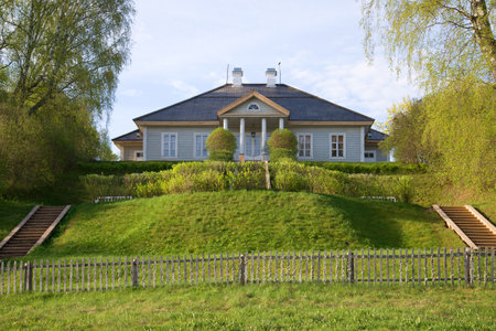 PUSHKINSKIYE GORY, RUSSIA - MAY 08, 2016: The house of the poet A. S. Pushkin in a manor Mikhaylovskoe in the May morningのeditorial素材