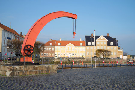 HELSINGOR, DENMARK - NOVEMBER 02, 2014: Old port crane in the urban landscape November morningのeditorial素材