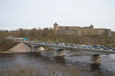 IVANGOROD, RUSSIA - MAY 01, 2015: View of the Ivangorod fortress and the border road bridge across the river Narva. Ivangorodのeditorial素材