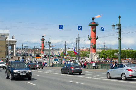 SAINT PETERSBURG, RUSSIA - MAY 24, 2015: View on the flaming Rostral columns from the Palace bridgeのeditorial素材
