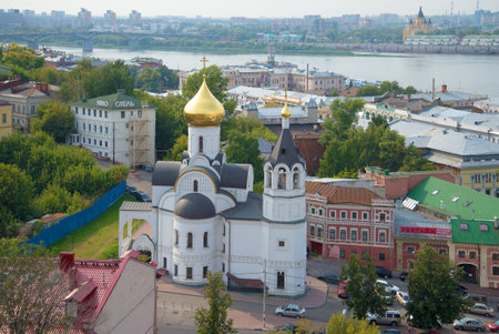 NIZHNY NOVGOROD, RUSSIA - AUGUST 27, 2015: "Icons of the Mother of God Kazan" church in a city landscape in the cloudy afternoonのeditorial素材