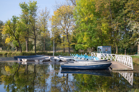 GATCHINA, RUSSIA - SEPTEMBER 24, 2015: Boat station on White lake sunny September dayのeditorial素材