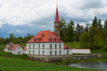 Priory Palace on the Black lake, cloudy day. Gatchina, Russiaのeditorial素材
