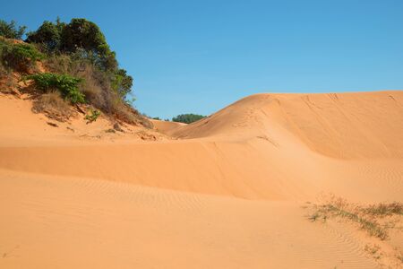 On the border of the Red dunes of Mui Ne. South Vietnamの写真素材