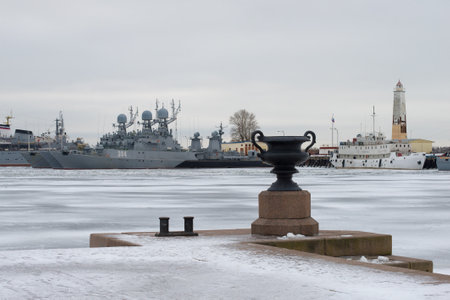 SAINT PETERSBURG, RUSSIA - JANUARY 25, 2017: View from the Petrovsky pier to the parking lot of the warships of the Baltic Navy on a gloomy January day. Kronstadtのeditorial素材