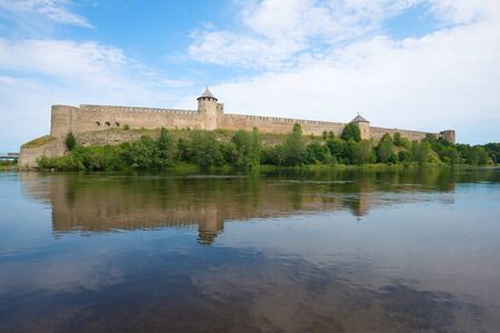 Ivangorod fortress on the Narva river on a cloudy August day. Russiaの写真素材